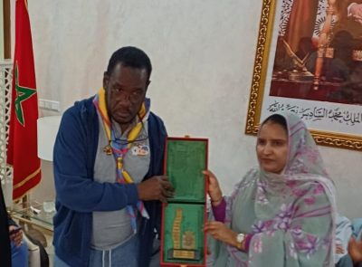 تكريم الرائد محمد برناوي… تتويجا لبصمة إعلامية اضاءة مخيم الداخلة الكشفي الدولي